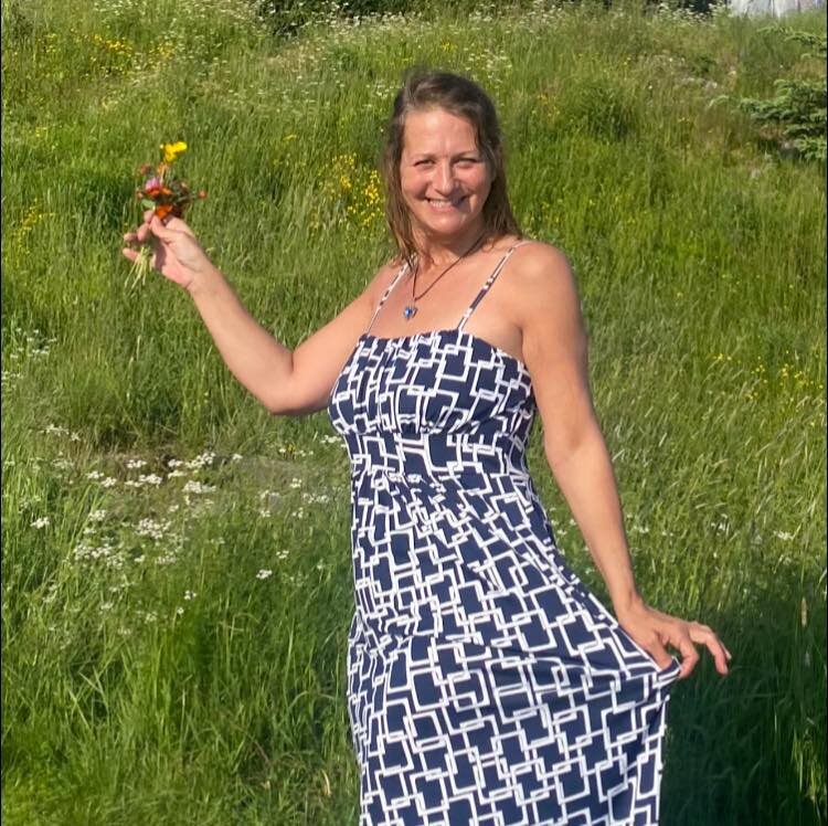 Jessica Dawn Stone in a sunny wildflower meadow